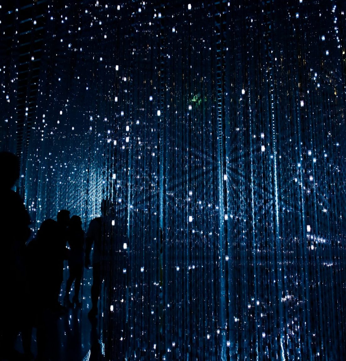 a group of people standing next to each other